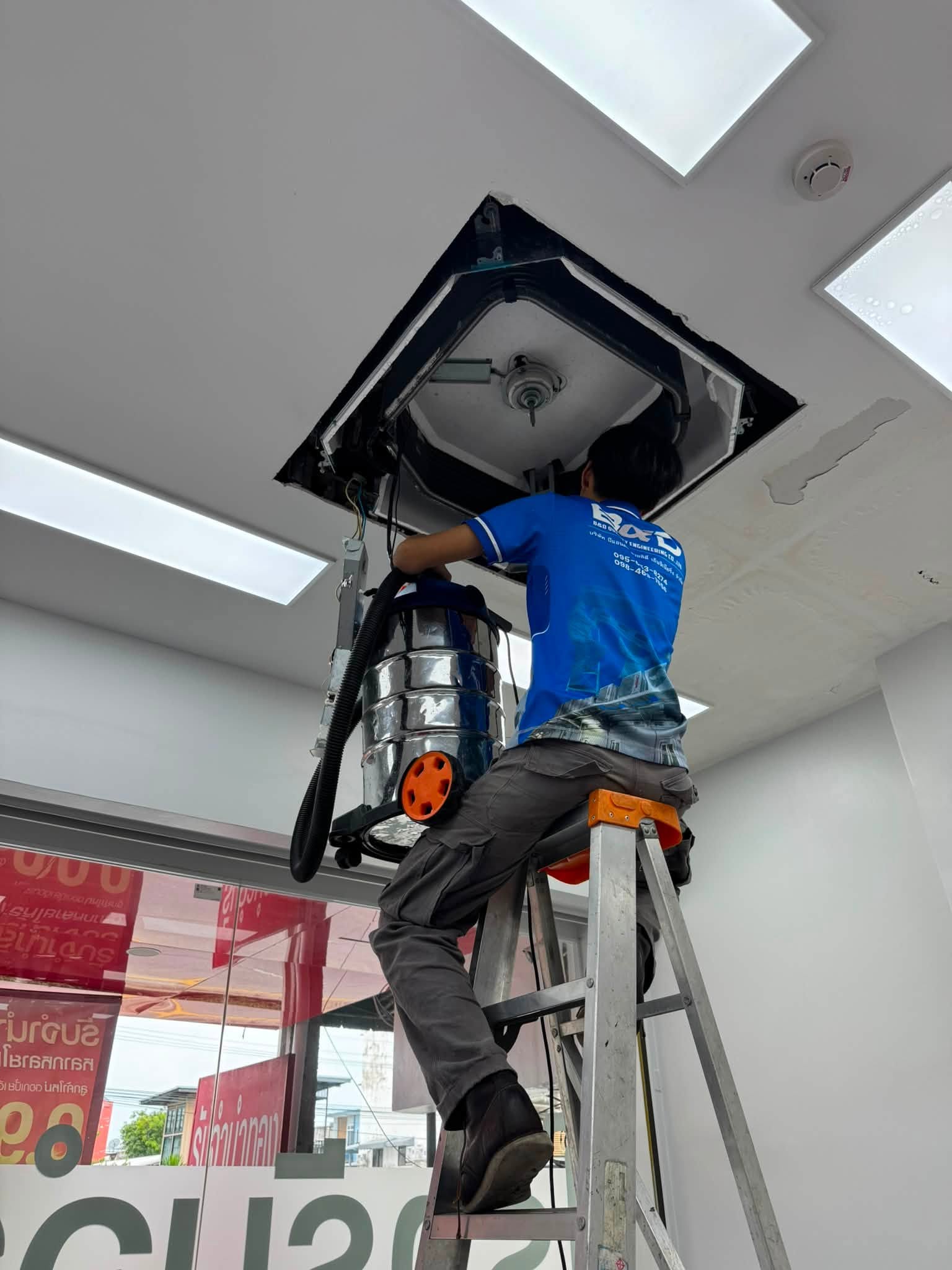 Ceiling cassette panel opened for preventive maintenance