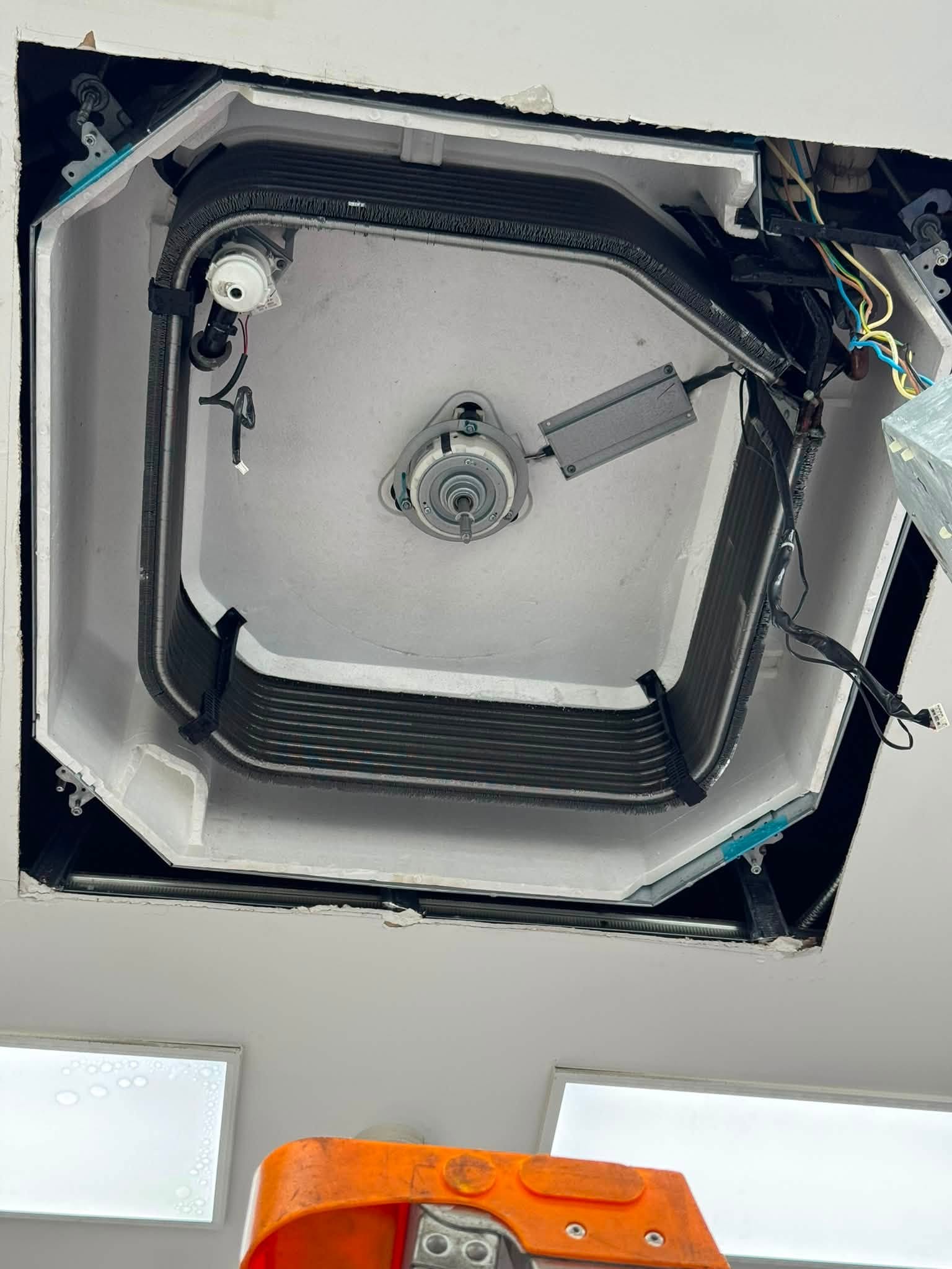 Ceiling cassette unit dismantled for deep cleaning